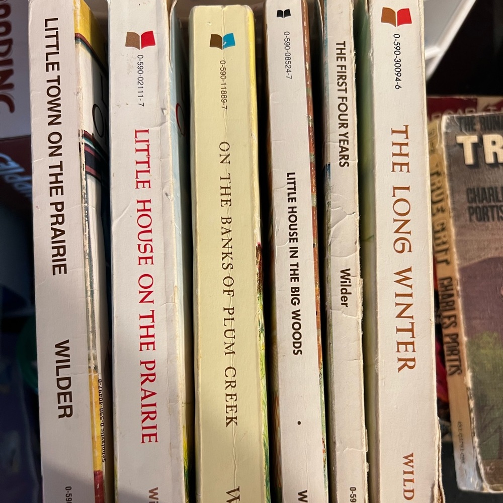 Lot of 6 Laura Ingalls Wilder soft back books. Vintage 1953 edition